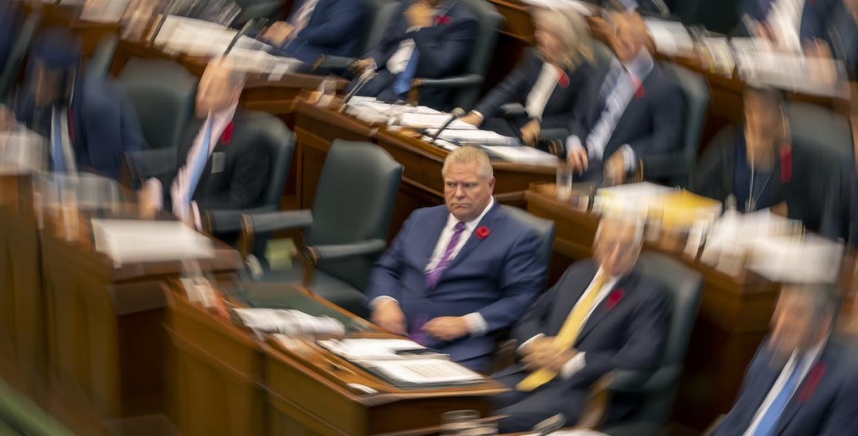 Ontario Premier Doug Ford sits in the Ontario legislature during Question Period as members debate a bill meant to avert a planned strike by 55,000 education workers. THE CANADIAN PRESS/Frank Gunn