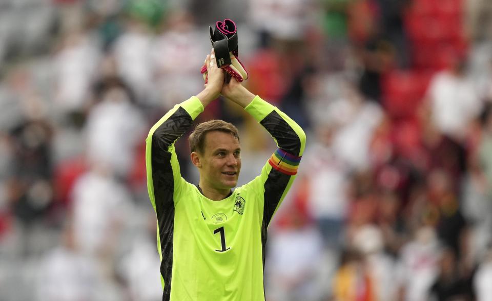 Germany's goalkeeper Manuel Neuer celebrates with fans after the Euro 2020 soccer championship group F match between Portugal and Germany in Munich, Saturday, June 19, 2021. (AP Photo/Matthias Schrader, Pool)
