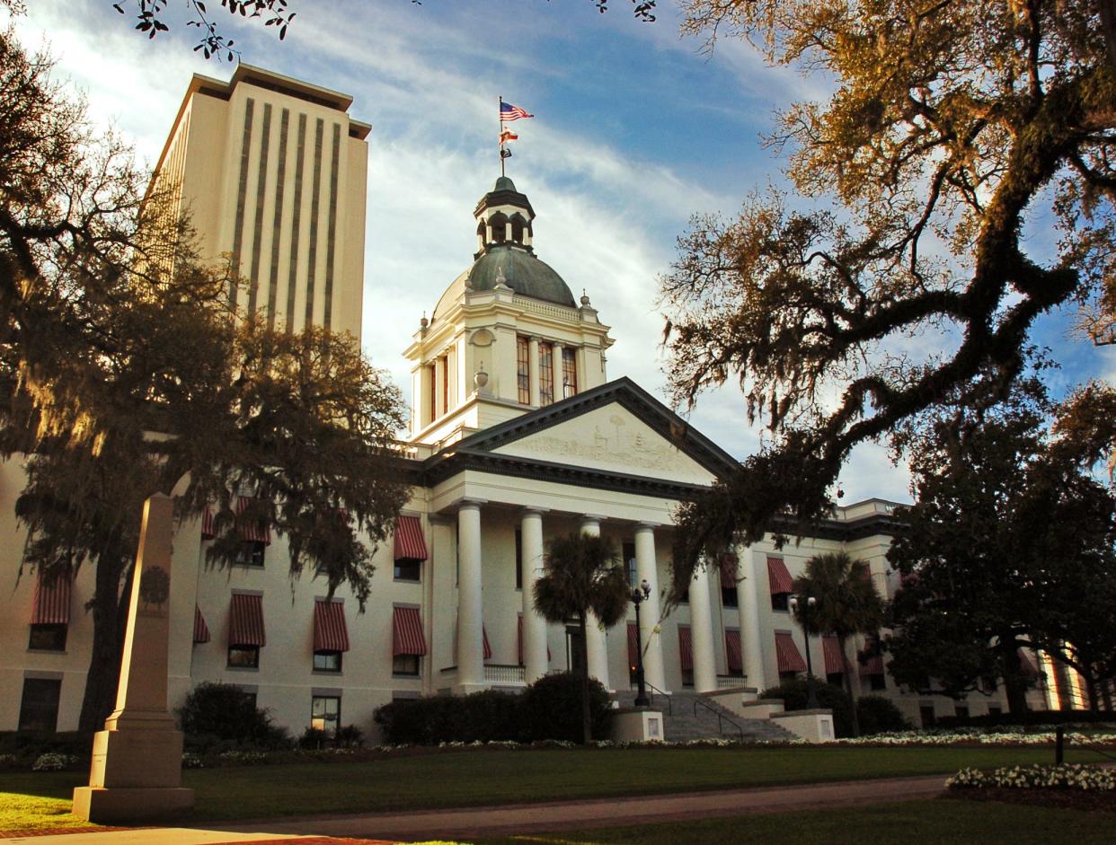 The old (foreground) and new (background) Florida State Capitol buildings in Tallahassee are shown in this photo from the 2005 start Florida Legislature's annual session.