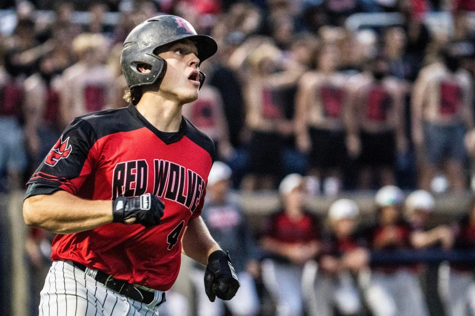 Conrad senior Brett Walmsley (4) runs for first base after he hits the ball against Delaware Military Academy during the DIAA baseball championship game at Frawley Stadium in Wilmington on Saturday, June 3, 2023. DMA won 7-1.