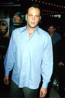Vince Vaughn is unaware of the shifty Norman Bates-like character lurking behind him at the Loews Cineplex Century Plaza premiere of New Line's The Cell