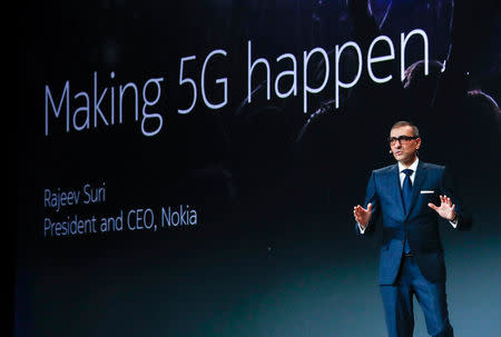 Rajeev Suri, Nokia's President and Chief Executive Officer, speaks during the Mobile World Congress in Barcelona, Spain February 25, 2018. REUTERS/Yves Herman