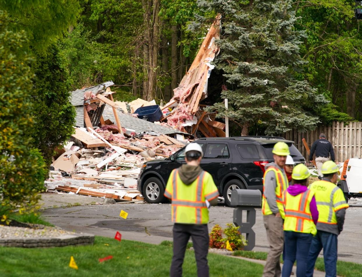 Authorities at the scene Friday morning of a home explosion on Continental Court in South River the night before.