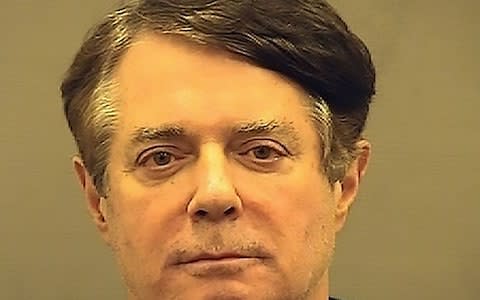 Paul Manafort has been residing in a Virginia jail since his conviction this summer - Credit: AFP