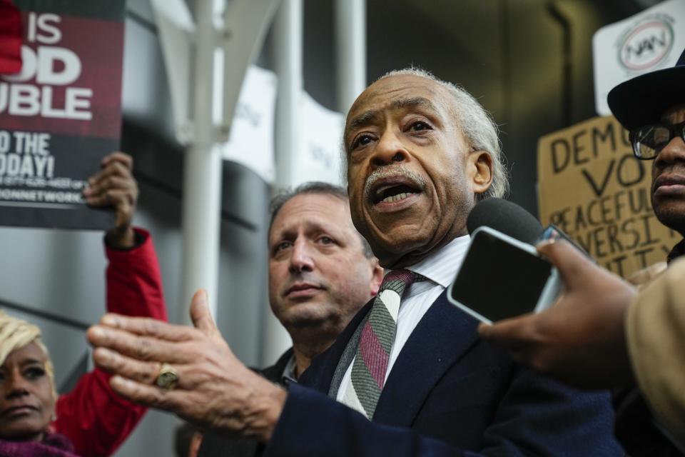 Rev. Al Sharpton speaks to the media during a protest outside the office of hedge fund billionaire Bill Ackman, who has donated millions to Harvard, to protest his campaign against diversity, equity, and inclusion Thursday, Jan. 4, 2024, in New York. Harvard University President Claudine Gay resigned Tuesday amid plagiarism accusations and criticism over testimony at a congressional hearing where she was unable to say unequivocally that calls on campus for the genocide of Jews would violate the school's conduct policy. (AP Photo/Frank Franklin II)