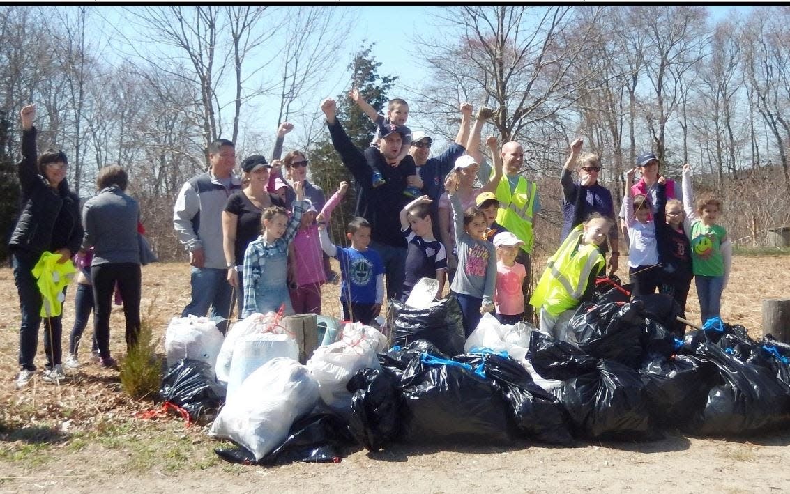 In this file photo, Lakeville Litter Lifters are seen during a cleanup in Lakeville for Earth Day 2018.