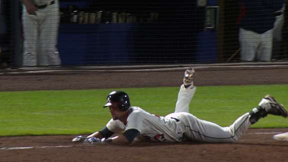 Braves coach Terry Pendleton grabs and shoves Chris Johnson after