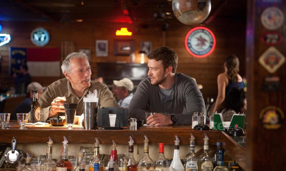 This film image released by Warner Bros. Pictures shows Clint Eastwood, left, and Justin Timberlake in a scene from "Trouble with the Curve." (AP Photo/Warner Bros. Pictures, Keith Bernstein)