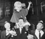 15th December 1969: British film and television stars (left to right) Hughie Green, Barbara Windsor, Tommy Cooper and Frankie Howerd promoting ITV's Christmas programmes. (Photo by Frank Barratt/Keystone/Getty Images)