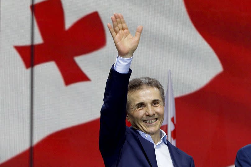 Billionaire Bidzina Ivanishvili, leader of the created by him the Georgian Dream party greets demonstrators during a rally in support of "Russian law" in Tbilisi, Georgia