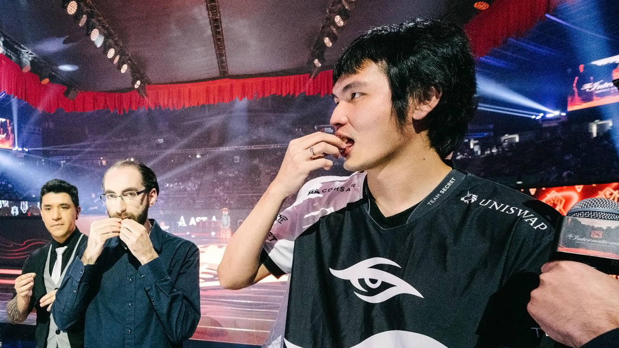 iceiceice eats the cheese after an exhibition match at TI11. (Photo: Valve via Dota 2 Flickr)