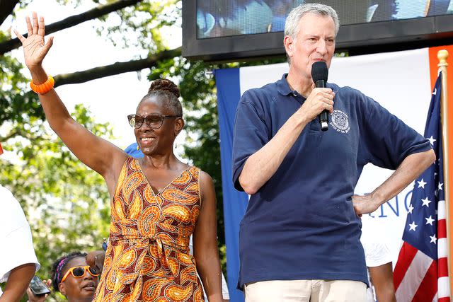 <p>Taylor Hill/Getty Images</p> Chirlane McCray and Bill de Blasio attend the "Hometown Heroes" tickertape parade on July 7, 2021, in New York City