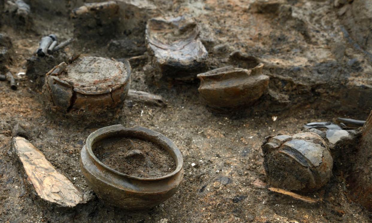 <span>An array of bronze age pots found at the Must Farm quarry excavation site in Cambridgeshire.</span><span>Photograph: Cambridge Archaeological Unit/PA</span>