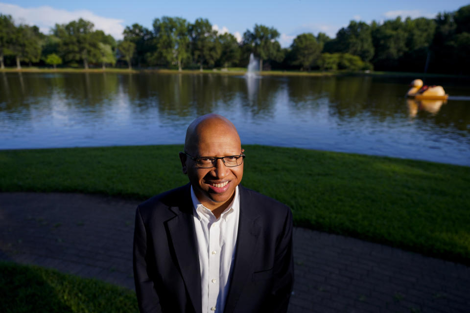 Sacoby Wilson, associate professor at the University of Maryland School of Public Health, poses for The Associated Press, Tuesday, Aug. 2, 2022, in Bowie, Md. Billions of dollars in climate and environment investments from the Inflation Reduction Act could flow to communities in the United States that have been plagued by pollution and climate threats for decades. “Over the last two years, there’s probably more money being invested in these communities than over the last 20 years,” Wilson said. (AP Photo/Julio Cortez)