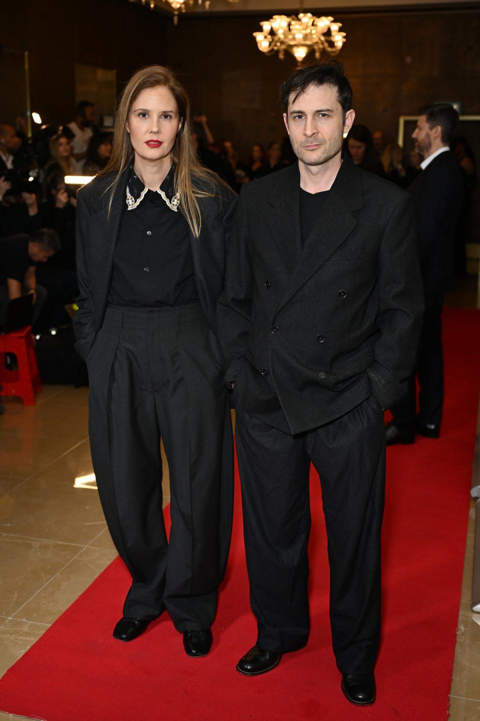 Triet pictured with Anatomy of a Fall co-writer Arthur Harari (Gareth Cattermole/Getty Images)