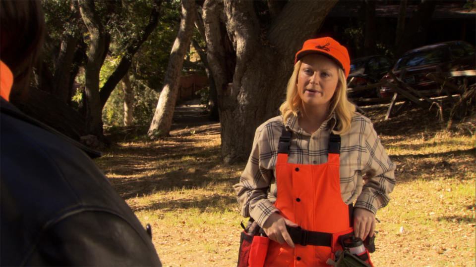 Leslie Knope (Amy Poehler) wearing hunting gear in Parks and Recreation