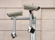 Surveillance cameras are pictured during the opening ceremony of the northern building complex of the new headquarters of the BND spy agency on March 31, 2014 in Berlin, Germany