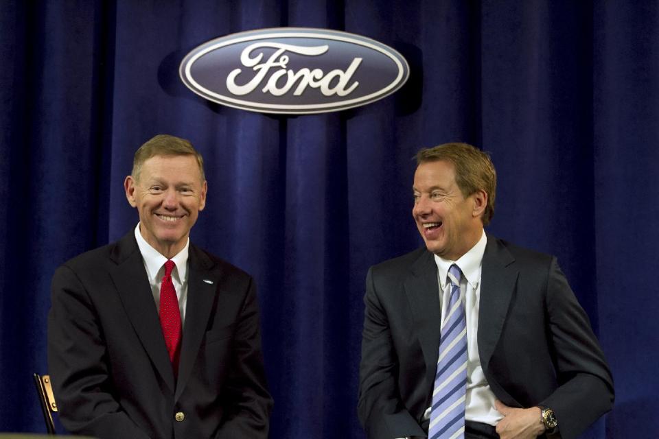 Ford Motor Company President and CEO Alan Mulally, left, shares a laugh with Executive Chairman for Ford William Ford while answering questions from the media after the company's annual shareholders meeting at the Hotel DuPont in Wilmington, Del., Thursday, May 10, 2012. Thursday's meeting lasted only 45 minutes, much of it spent with shareholders praisingMulally and Ford Jr. for the company's turnaround. (AP Photo/Ron Soliman)