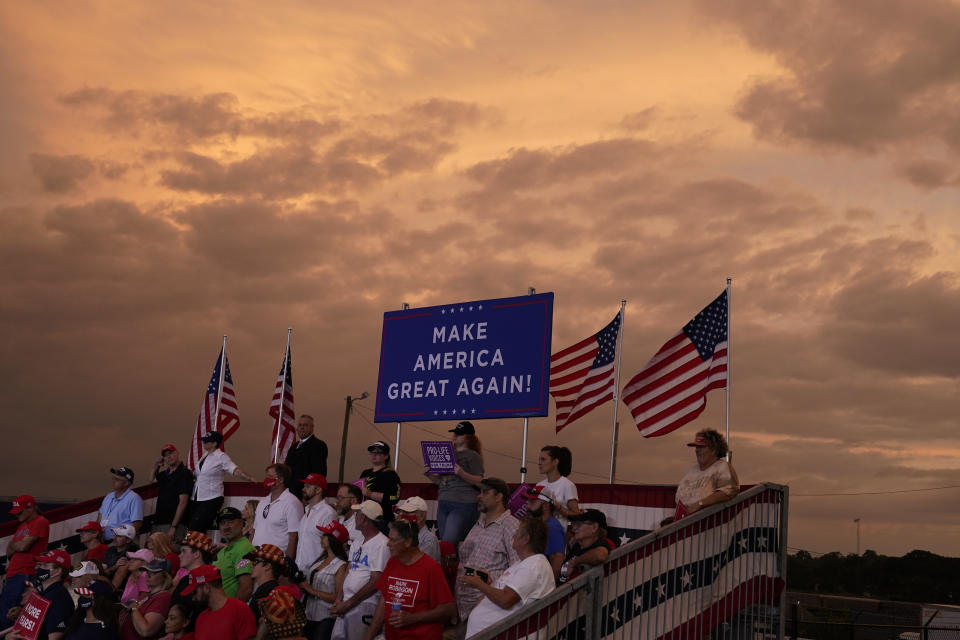 People cheer as President Donald Trump speaks during a campaign rally at Smith Reynolds Airport, Tuesday, Sept. 8, 2020, in Winston-Salem, N.C. (AP Photo/Evan Vucci)