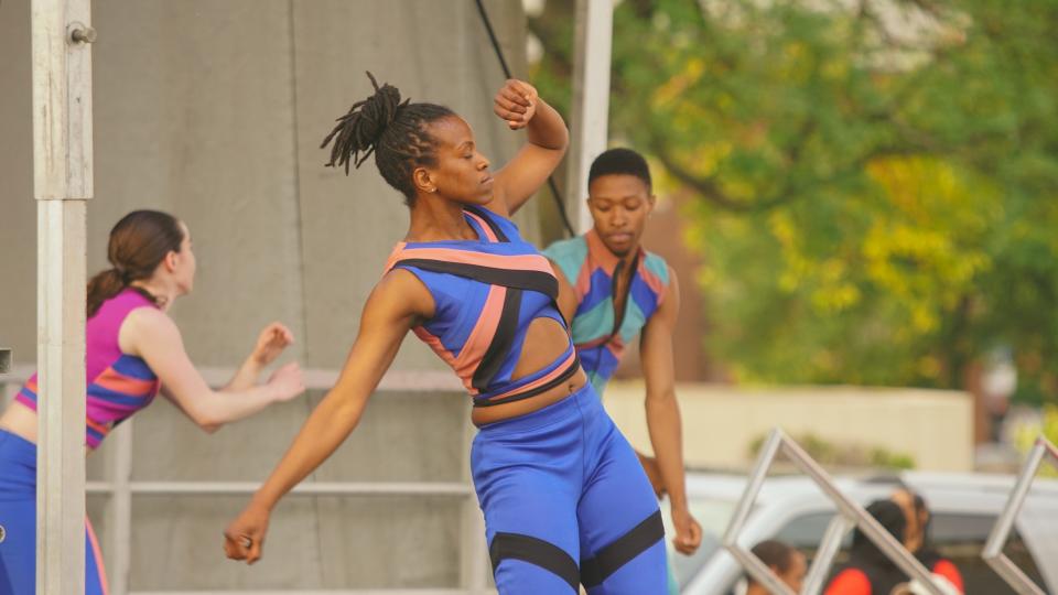 Three dancers from the Garth Fagan Dance Company perform during the 2023 Juneteenth Festival at MLK Park.