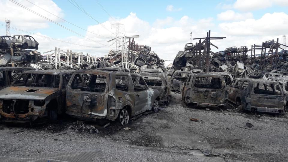 Burnt out vehicles on car lot in Carcroft in Doncaster. (PA)