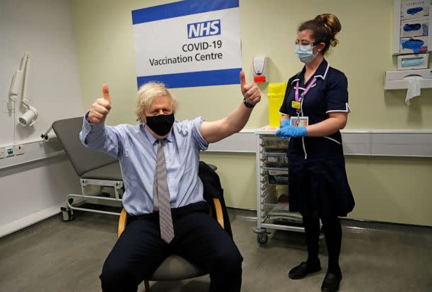 PHOTO: British Prime Minister Boris Johnson gestures after receiving the first dose of AstraZeneca's COVID-19 vaccine administered by a nurse at St.Thomas' Hospital in London, March 19, 2021. (Frank Augstein/AP, File)