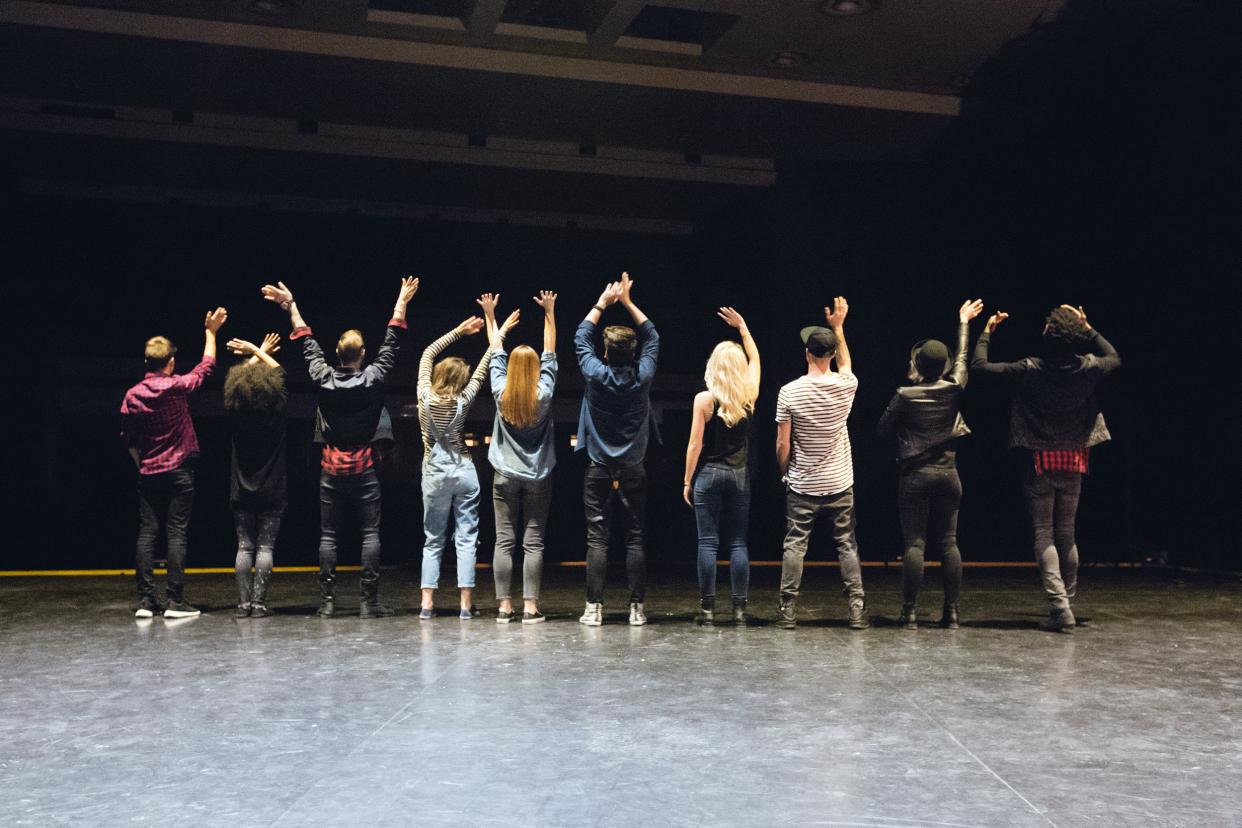 group of young dancers on the stage