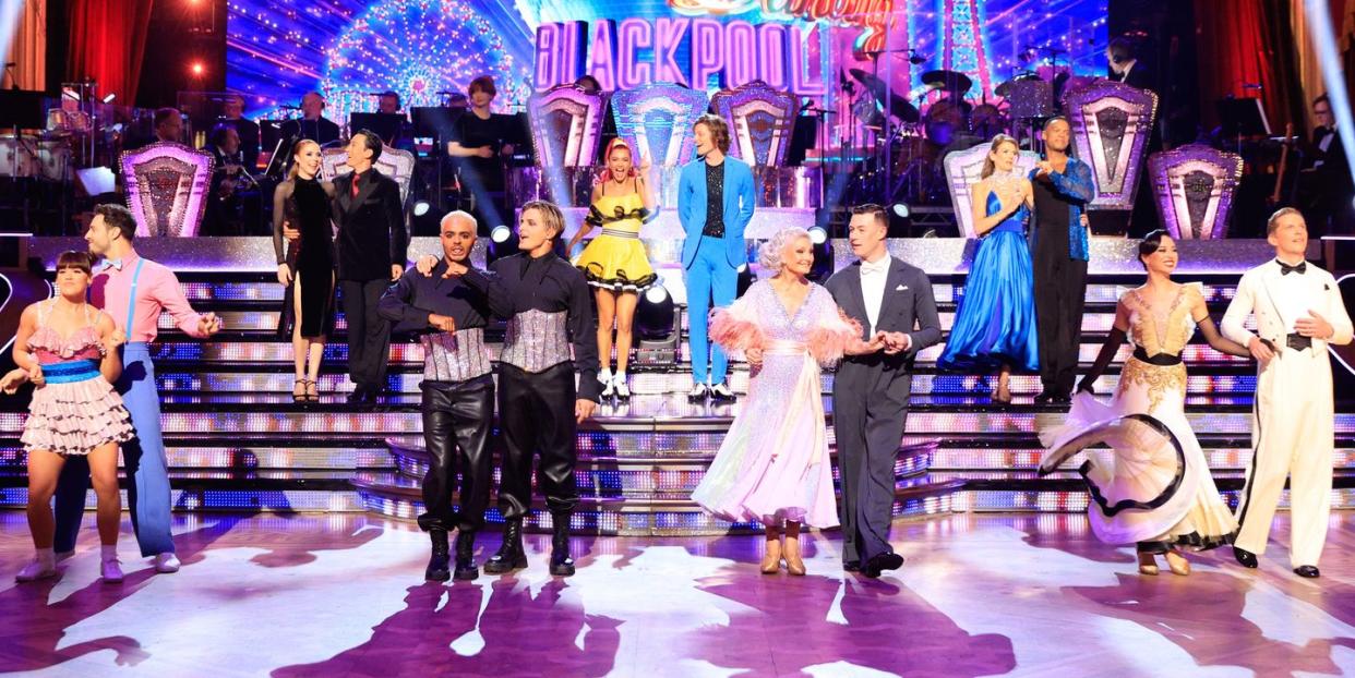 strictly come dancing couples line up on stage in blackpool tower ballroom