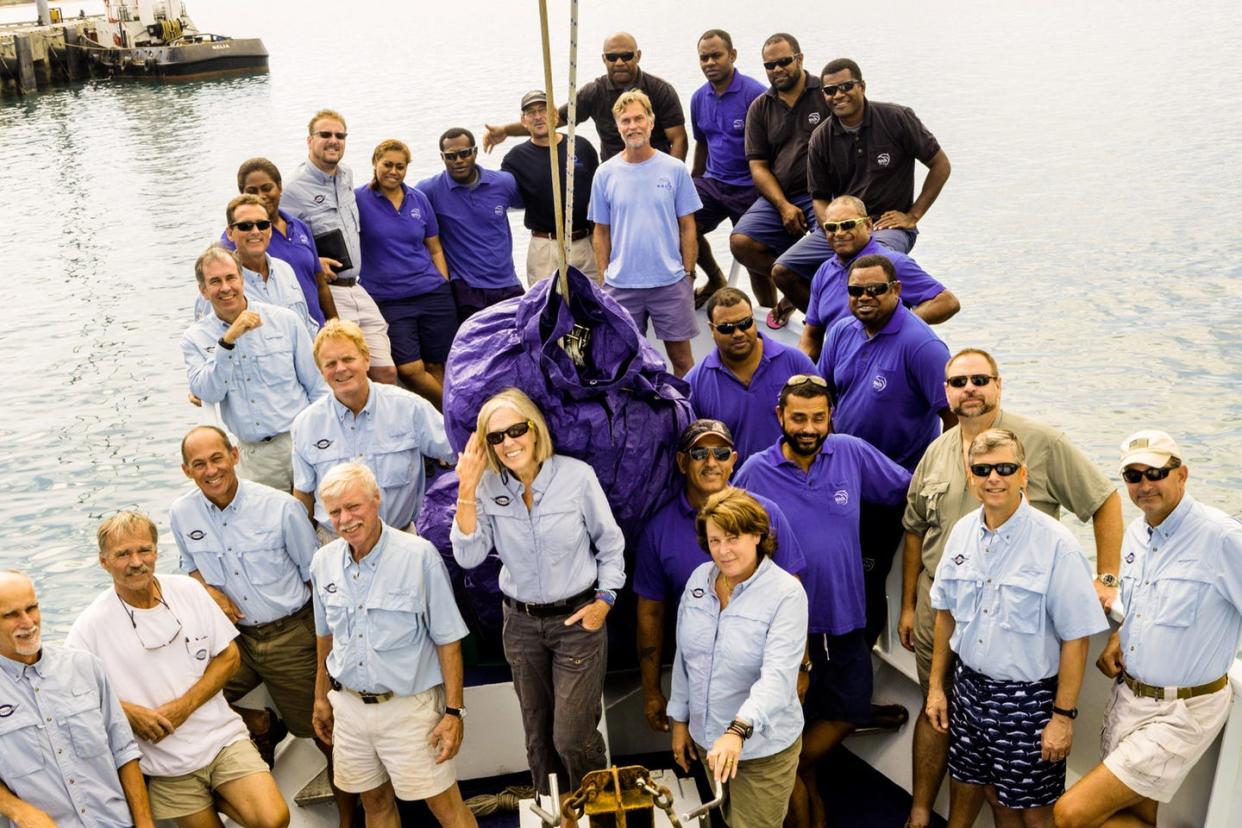 team of researchers on boat