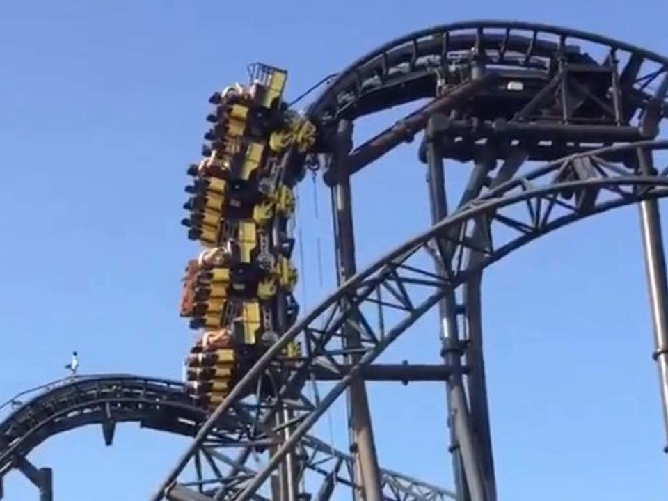 Theme park riders were left hanging in the air for 20 minutes on Tuesday when The Smiler ride at Alton Towers broke down.Eyewitnesses said the rollercoaster halted around 100 feet from the ground, amid a heatwave which saw parts of the UK exceed 30C.Video footage showed several people left stranded on board the paused ride.Their carriage eventually returned to the attraction’s platform at 6pm.The Smiler, like many rollercoasters, has sensors along the length of its track.These devices can halt the ride as a precaution if they sense anything is wrong.“We apologise to all guests affected by the stoppage on The Smiler late [Tuesday] afternoon,” an Alton Towers spokesperson said. “Our guest relations team have spoken to everyone on board to offer return tickets to the park as compensation for the inconvenience.“Our technical team are working to reset the ride this evening so this should not affect guests visiting the park tomorrow.”The Smiler previously made headlines in 2015, after a crash on the rollercoaster left five people seriously injured, including two teenage girls who both required leg amputations.The collision occurred when a fully loaded carriage, carrying 16 people, crashed into an empty, stationary car at 90mph.Following the crash, it took up to five hours for all the passengers to be freed from the wreckage.Merlin Attractions, the theme park’s operator, was fined £5m after admitting that health and safety breaches had led to the crash.Additional reporting by agencies