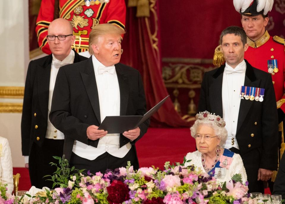 US President Donald Trump makes a speech as The Queen listens during the State Banquet at Buckingham Palace (PA)