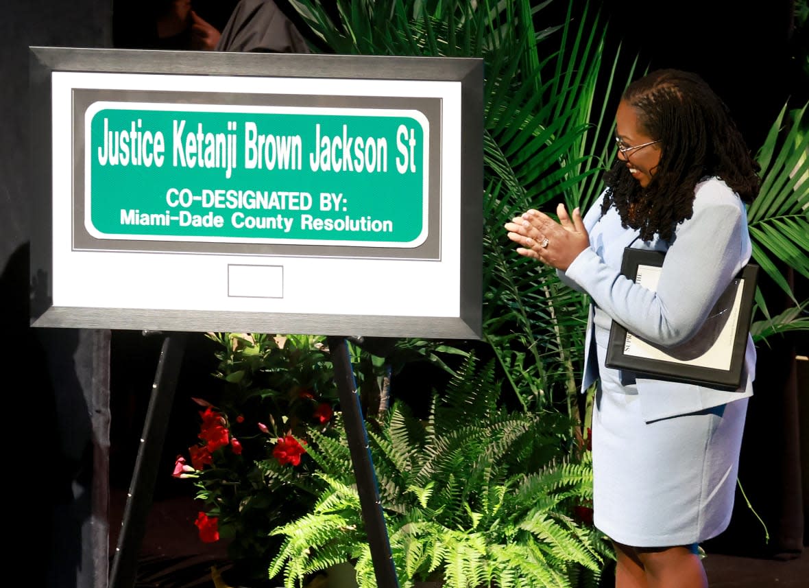 Supreme Court Associate Justice Ketanji Brown Jackson looks on at a street sign named after her during a street renaming ceremony in Miami-Dade County on March 6, 2023, in Cutler Bay, Florida. Justice Jackson is the first Black woman to sit on the Supreme Court and the first Supreme Court Justice from Miami-Dade County. (Photo by Joe Raedle/Getty Images)