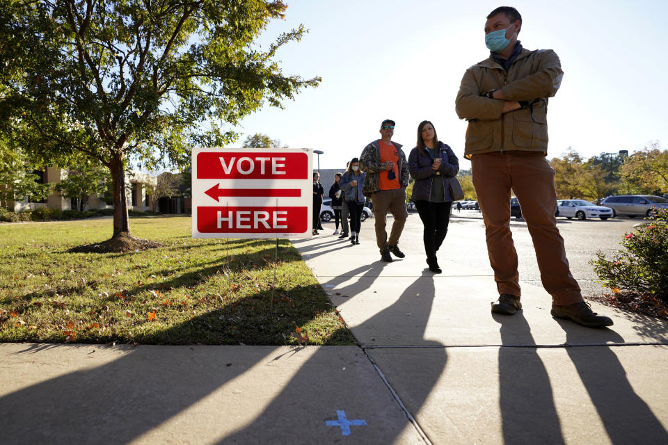 Image: Voters stand in line to cast ballots in Ridgeland, Miss., on Election Day. (Rogelio V. Solis / AP file)