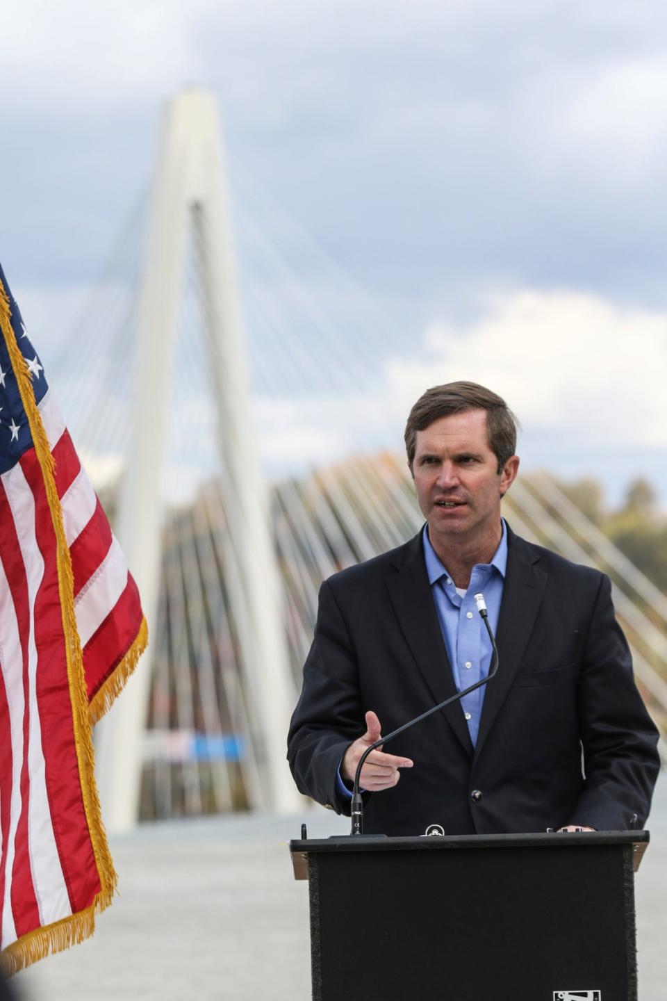 Governor Andy Beshear speaks at the ribbon cutting for the Russell Viaduct on Tuesday, Nov. 2, 2021 in Russell, Ky. The $24 million project is scheduled to open the week of November 15. (Matt Jones/The Daily Independent via AP) ORG XMIT: KYASH101