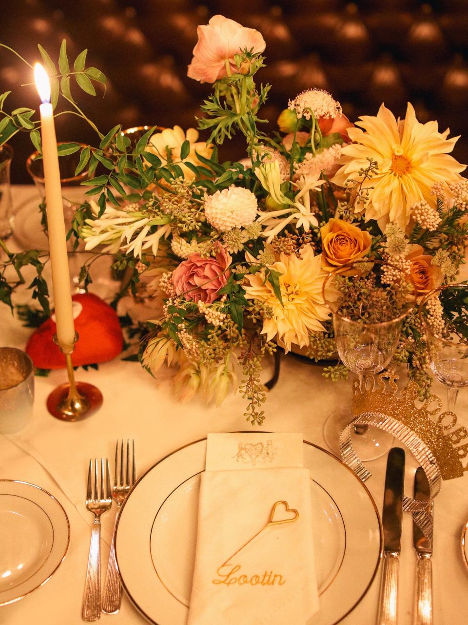 For the place settings, we embroidered everyone’s names and nicknames onto their napkins. Each seat got a little heart sparkler, and we added heart-shaped surprise balls, which were passed around the tables.