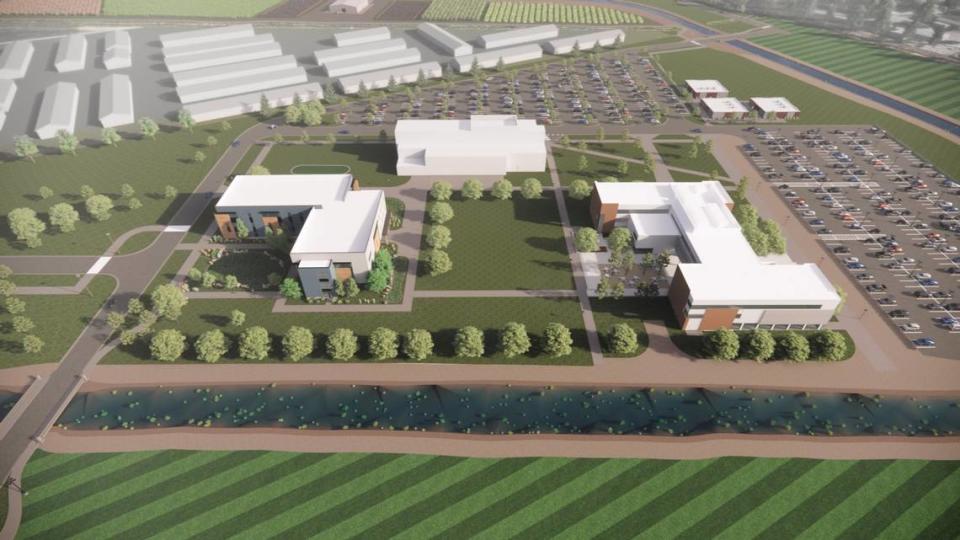 The already-built main campus is at right in this aerial rendering, looking northeast. Two new conjoined buildings are at left, a third is in center and a new barn and working farm are at top.