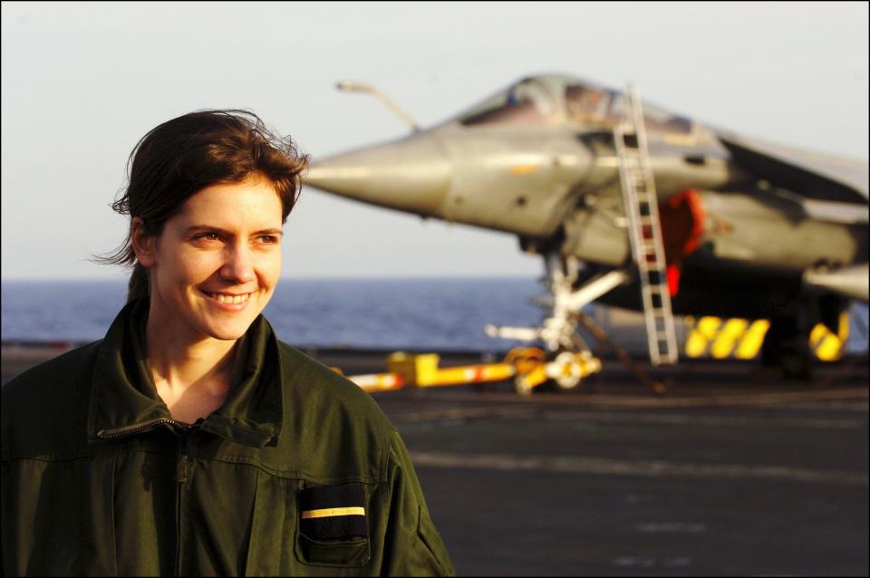 Emilie Denis, the first woman fighter pilot of the French navy in Toulon, France,&nbsp;in front of her Rafale.