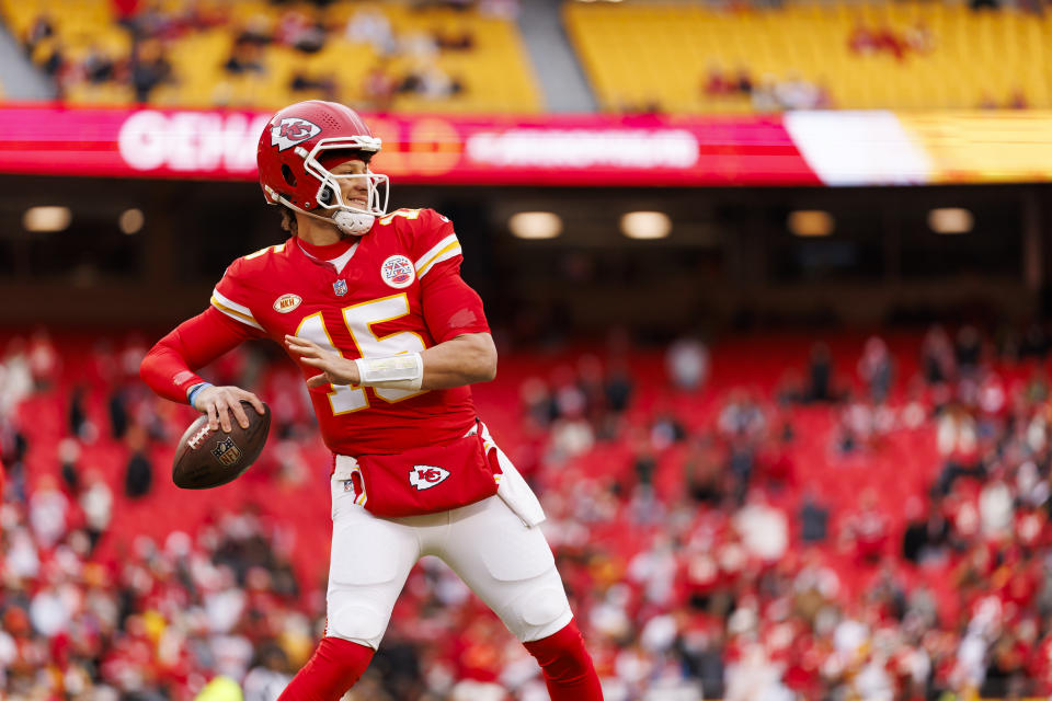 KANSAS CITY, MISSOURI - DECEMBER 31: Patrick Mahomes #15 of the Kansas City Chiefs looks to throw a pass during pregame warmups before an NFL football game against the Cincinnati Bengals at GEHA Field at Arrowhead Stadium on December 31, 2023 in Kansas City, Missouri. (Photo by Ryan Kang/Getty Images)