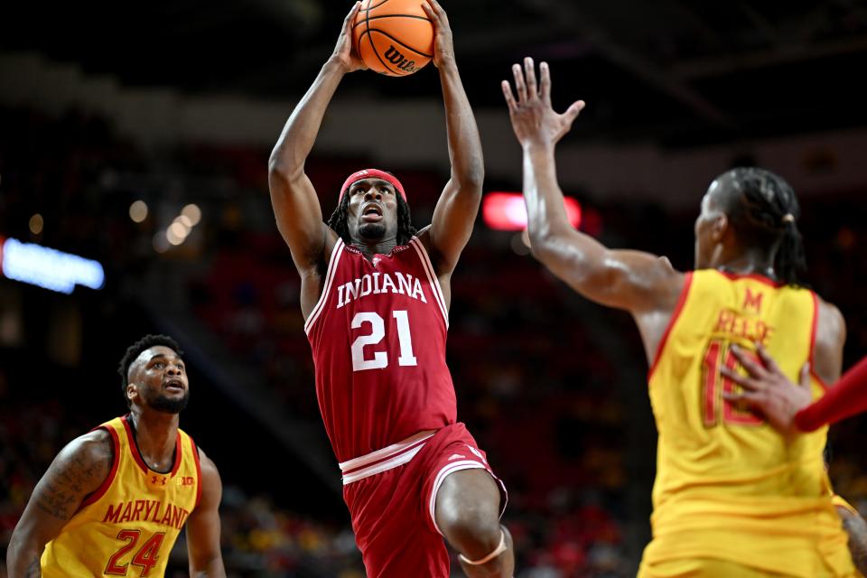 COLLEGE PARK, MARYLAND - MARCH 03: Mackenzie Mgbako #21 of the Indiana Hoosiers drives to the basket in the first half against Julian Reese #10 of the Maryland Terrapins at Xfinity Center on March 03, 2024 in College Park, Maryland. (Photo by Greg Fiume/Getty Images)