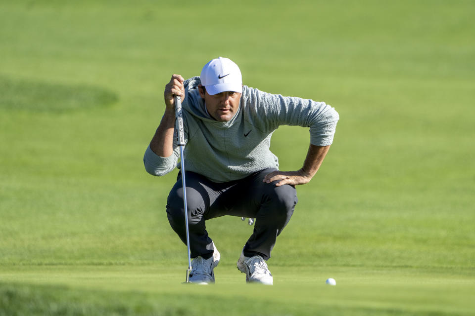 Scottie Scheffler lines up his putt on the 15th hole during the second round of the AT&T Pebble Beach Pro-Am golf tournament at Pebble Beach Golf Links. Mandatory Credit: Kyle Terada-USA TODAY Sports