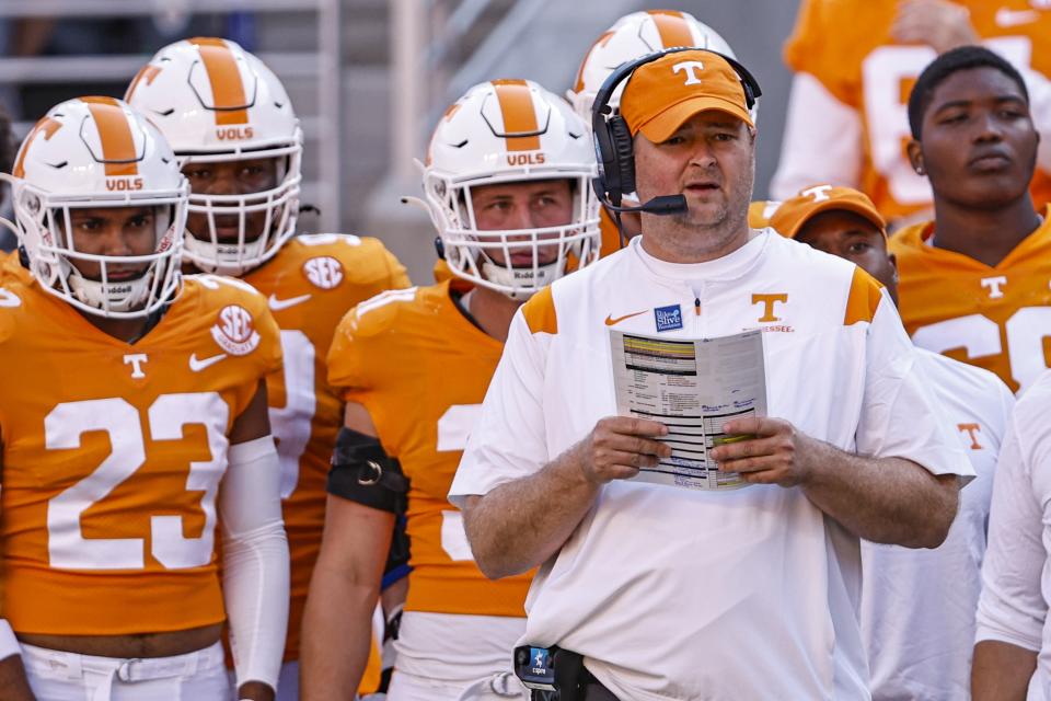 FILE - Tennessee head coach Josh Heupel watches his team during the first half of an NCAA college football game against Florida, Saturday, Sept. 24, 2022, in Knoxville, Tenn. Heupel was selected the top coach in the Associated Press SEC Midseason Awards, Wednesday, Oct. 12, 2022. (AP Photo/Wade Payne, File)