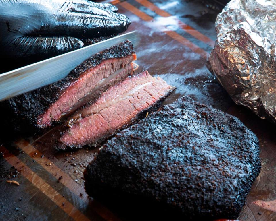 A luscious beef brisket is sliced to order at Dampf Good Barbecue in Morrisivlle.