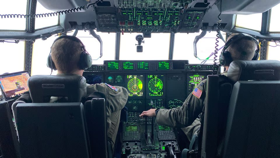 Crew members on board  WC-130J Super Hercules aircraft during Hurricane Idalia. - Victoria Kennedy/CNN