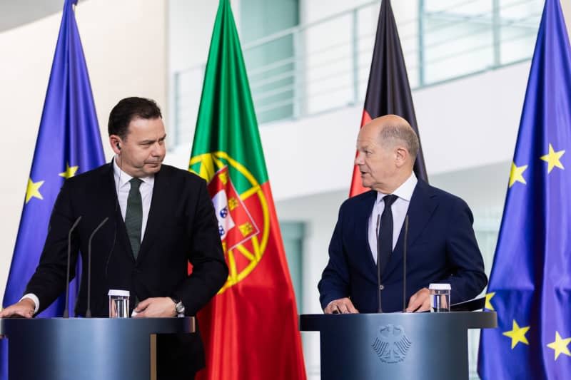 Germany's Chancellor Olaf Scholz (R) takes part in a joint press conference with Luis Montenegro (L), Prime Minister of Portugal, following talks at the Federal Chancellery. Christoph Soeder/dpa