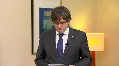 Sacked Catalan President Carles Puigdemont makes a statement in this still image from video calling for the release of "the legitimate government of Catalonia", after a Spanish judge ordered nine Catalan secessionisleaders to be held in custody pending a potential trial over the region's independence push, in Brussels, Bet lgium, November 2, 2017. TV3 via REUTERS