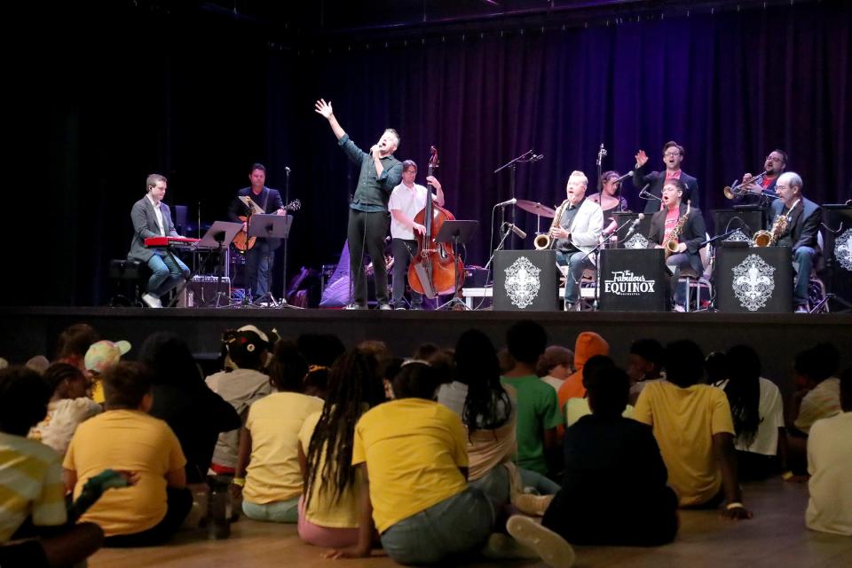 Clay Johnson, Jeremy Davis, and the Fabulous Equinox Orchestra perform a free concert for summer campers from YMCAs throughout coastal Georgia on Wednesday, June 14, 2023 at District Live in Savannah.