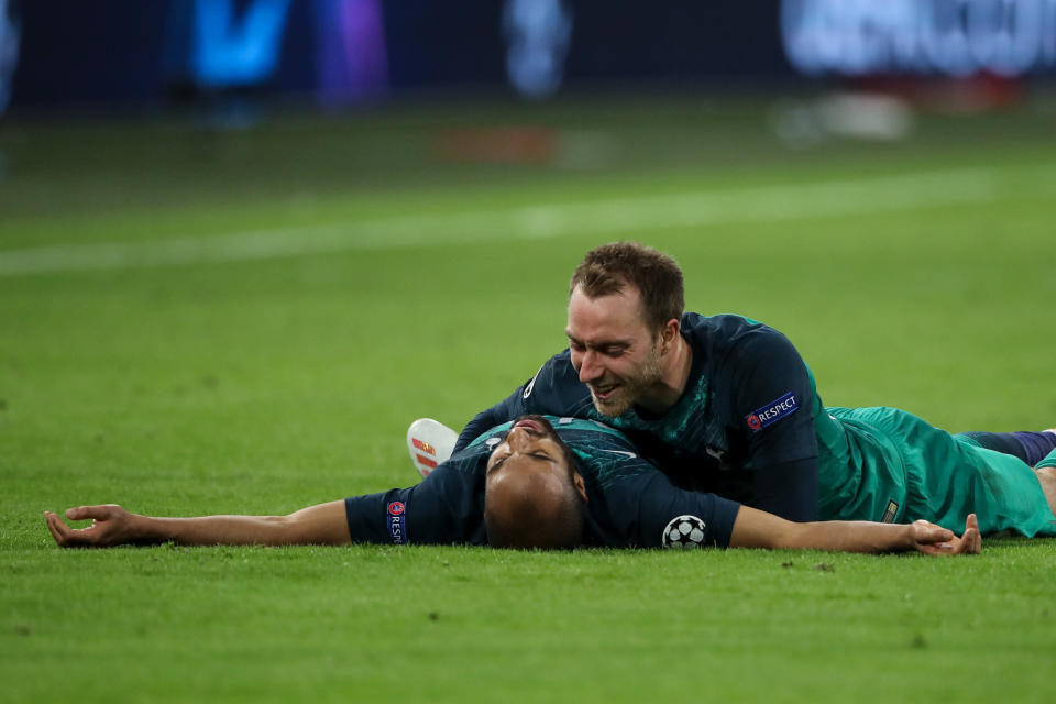 AMSTERDAM, NETHERLANDS - MAY 08: Lucas Moura of Tottenham Hotspur celebrates at full time with Christian Eriksen of Tottenham Hotspur during the UEFA Champions League Semi Final second leg match between Ajax and Tottenham Hotspur at the Johan Cruyff Arena on May 8, 2019 in Amsterdam, Netherlands. (Photo by Matthew Ashton - AMA/Getty Images)