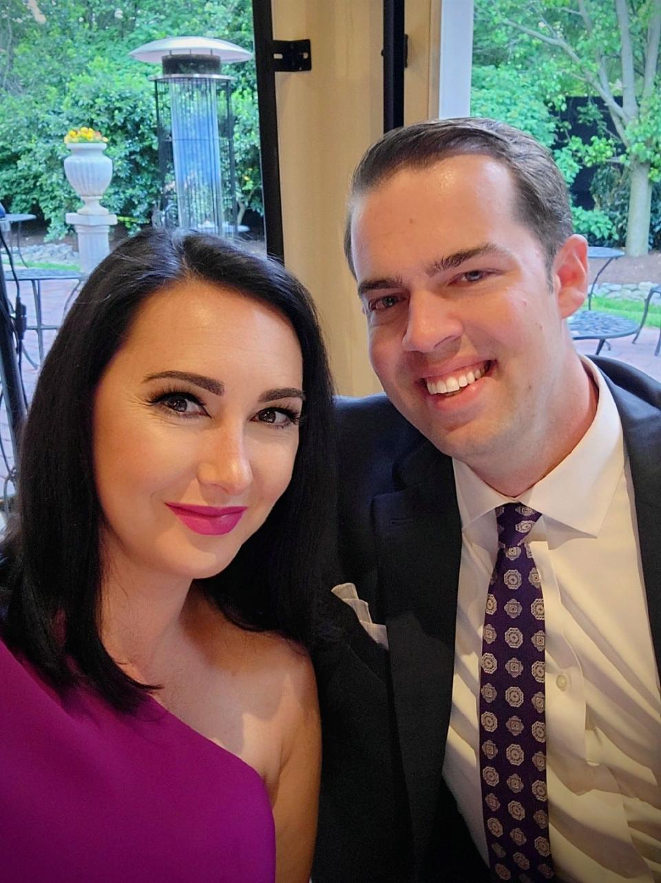 Emily and Travis Hardman during the wedding before Emily went into labor.