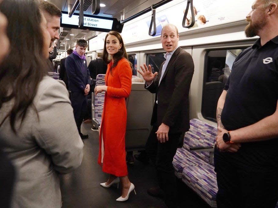 Prince William and Kate Middleton ride the Elizabeth Line in 2023.
