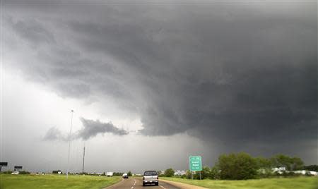 A severe thunderstorm wall cloud is seen over the area of Canton, Mississippi April 29, 2014. REUTERS/Gene Blevins